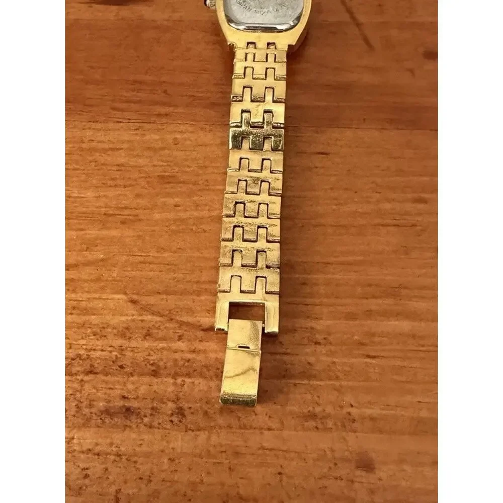 Nolan Miller Glamour Collection Crystal Gold Tone Bracelet Watch Mother Of Pearl